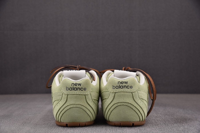 M*u M*u x New Balance Leather Sneakers UM002