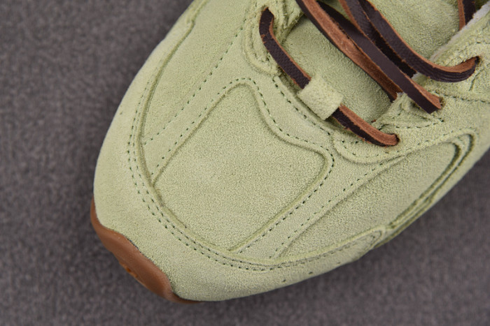 M*u M*u x New Balance Leather Sneakers UM002